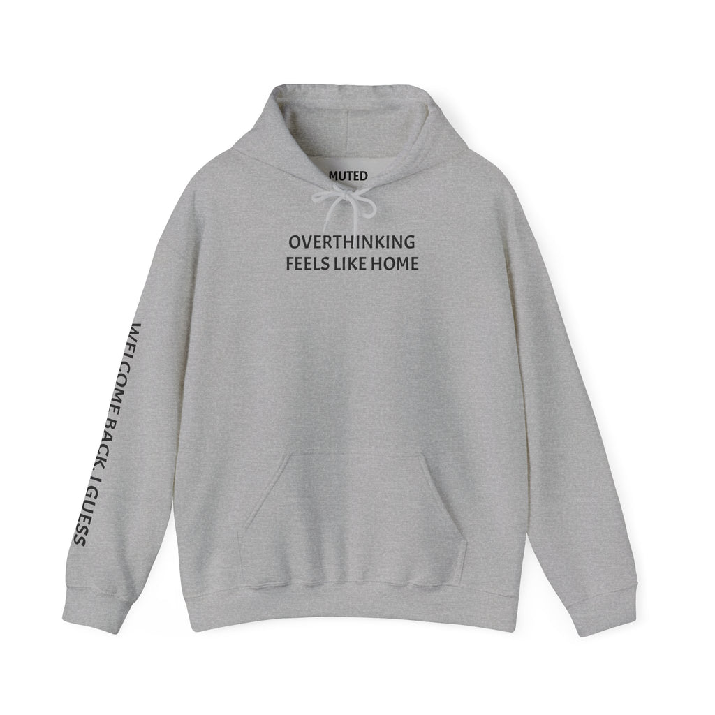 Overthinking Feels Like Home Hoodie — "Welcome Back, I Guess" Sleeve Text