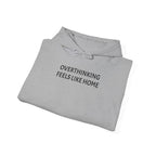 Overthinking Feels Like Home Hoodie — "Welcome Back, I Guess" Sleeve Text