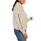 Overthinking Feels Like Home Hoodie — "Welcome Back, I Guess" Sleeve Text