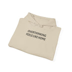 Overthinking Feels Like Home Hoodie — "Welcome Back, I Guess" Sleeve Text
