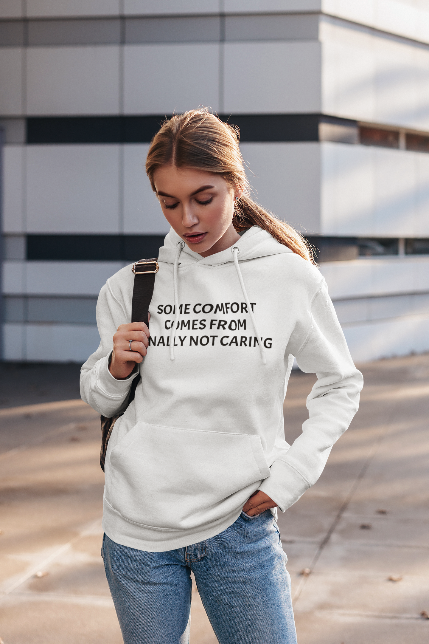 “Some Comfort Comes From Finally Not Caring” Hoodie — Minimalist White Graphic Hooded Sweatshirt