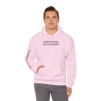 Overthinking Feels Like Home Hoodie — "Welcome Back, I Guess" Sleeve Text